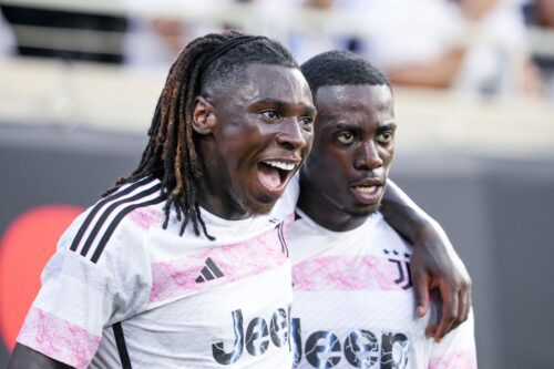 A thrilling football match between Juventus and Real Madrid, showcasing their historic rivalry and tactical brilliance.